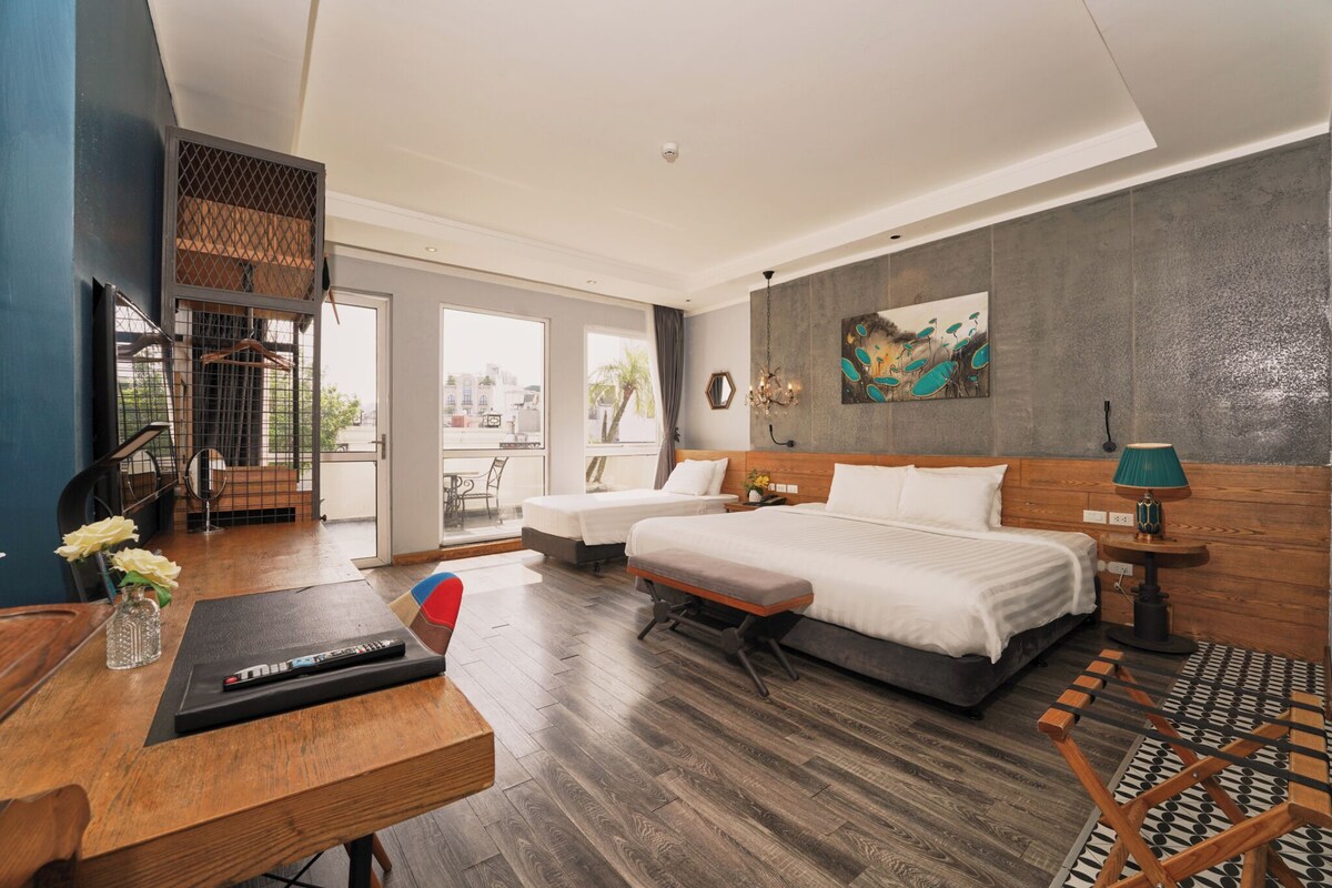 Family Triple Room, City View | Down comforters, minibar, in-room safe, desk