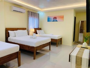 Executive Quadruple Room | Free WiFi, bed sheets - MCA HOSTEL (Panglao)