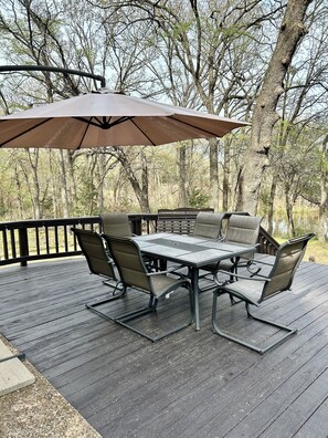 Outdoor dining - This relaxing cabin is cozy and secluded with private pond and fishing dock (Kingston)