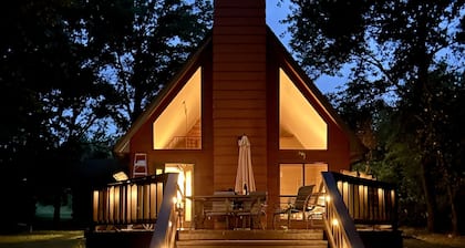 This relaxing cabin is cozy and secluded with private pond and fishing dock