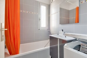 Bathtub, hair dryer