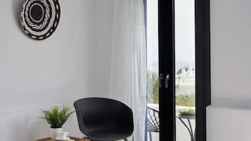 Standard Room, Partial Sea View | Minibar, WiFi (free), bed sheets