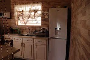 Executive Apartment, 1 Queen Bed | Private kitchen | Full-size fridge, microwave, oven, stovetop