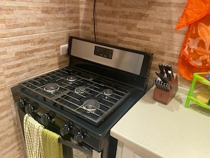 Executive Apartment, 1 Queen Bed | Private kitchen | Full-sized fridge, microwave, oven, stovetop