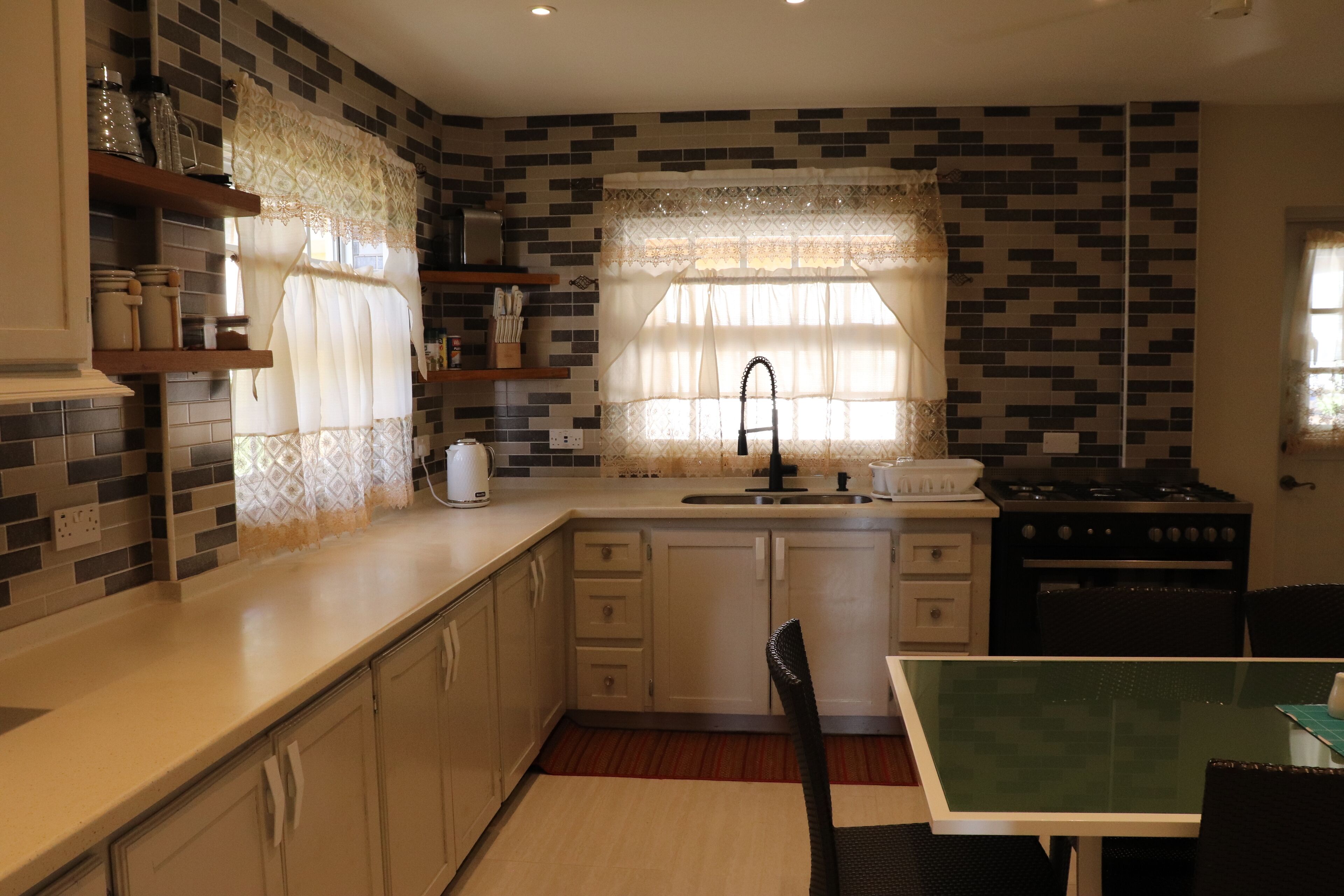 Family Apartment, 2 Bedrooms, Ocean View | Private kitchen | Full-size fridge, microwave, oven, stovetop