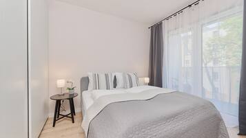 Apartment, 1 Bedroom, Balcony | 1 bedroom, bed sheets