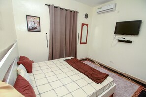1 chambre, fer et planche à repasser, Wi-Fi gratuit, draps fournis