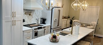 Unique waterfront home, Hot Tub, private boat dock,  walk to beach, pet friendly