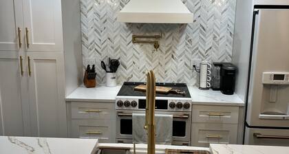 Unique waterfront home, Hot Tub, private boat dock, walk to beach, pet friendly