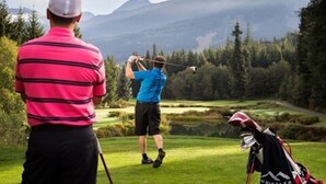 A golf course with a mountainous backdrop. - Mountainside 1BRM & Loft : Sleeps 4 ,Free Parking, Near Lakes, Restaurants & Shops! (Whistler)