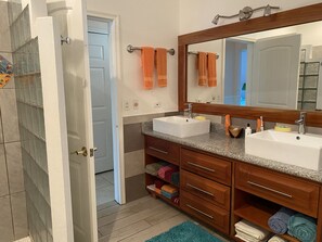 Shower, hair dryer, towels, soap