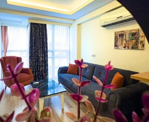 Appartement, 1 chambre | Coin séjour | Imprimantes
