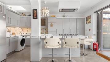 House, Multiple Beds | Private kitchen