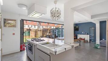 House, Multiple Beds | Private kitchen