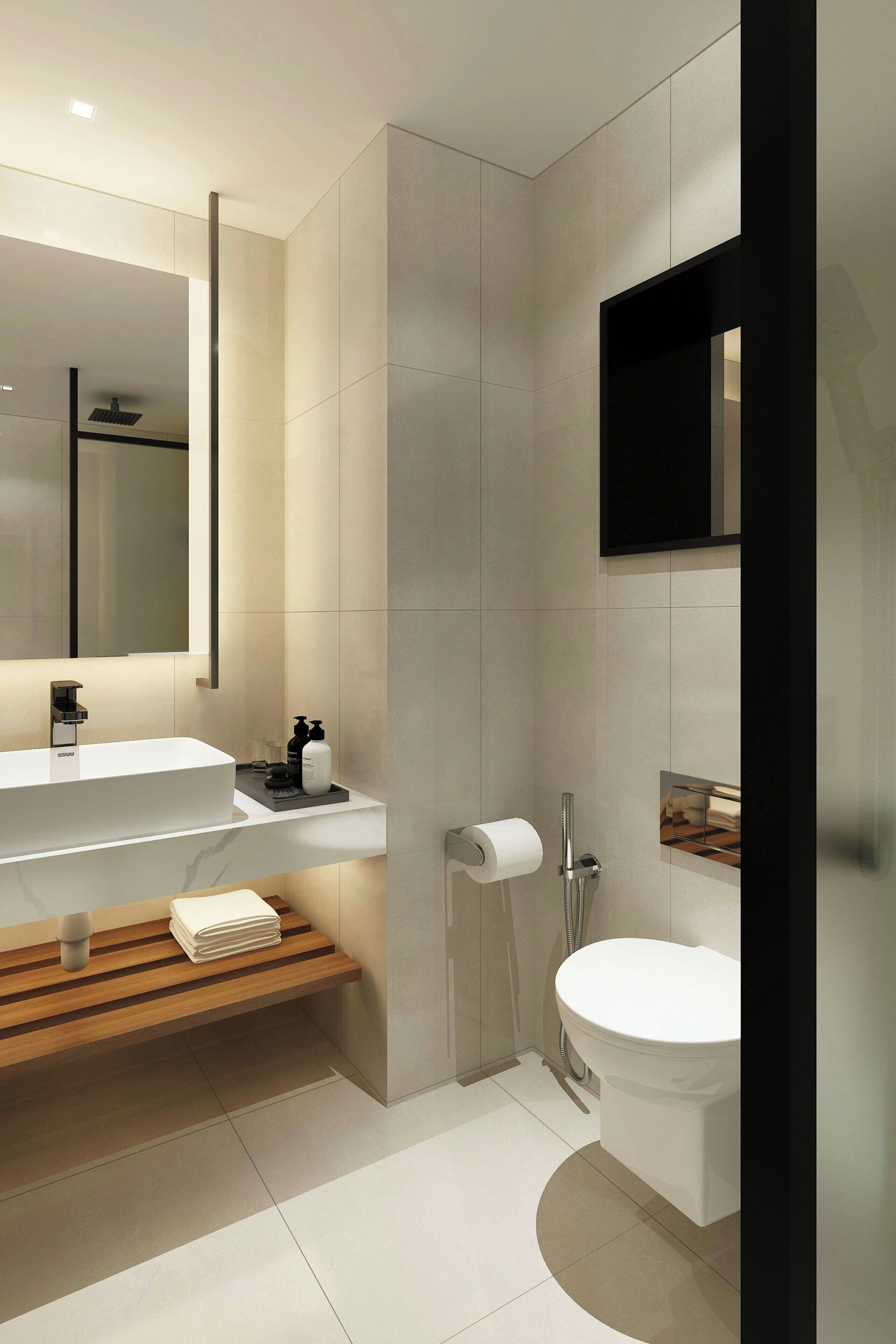 A modern bathroom with a large mirror, a white sink, a toilet, and a shower area.