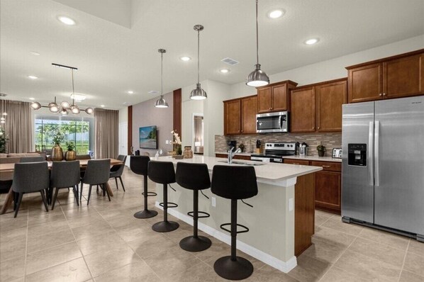 Refrigerador, microondas, horno y parrilla de estufa 