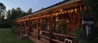 Log Cabin house on 10.5 acers of wooded land. Accommodates 20 plus guest. 