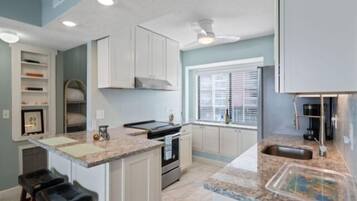 Fridge, microwave, dishwasher, coffee/tea maker