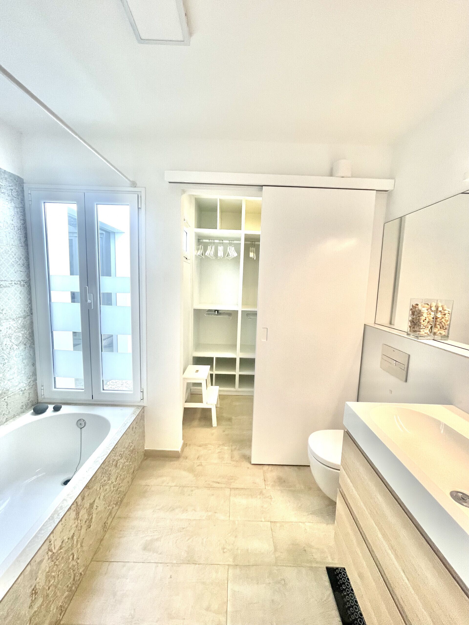 Bathtub, hair dryer, towels