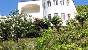 A white building with multiple windows and a curved facade. - Heavenly View (Cofresi)