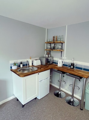 Fridge, microwave, electric kettle, toaster