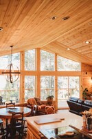 Luxury Suite | Living area | 75-inch Smart TV with digital channels, TV, Netflix