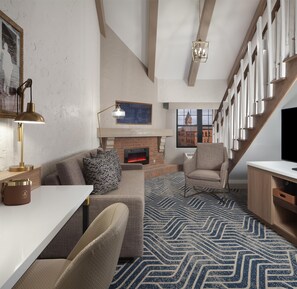 Suite, 1 King Bed (Loft) | Living area | 50-inch flat-screen TV with digital channels - Hotel Royer Urbana Champaign, Tapestry Collection by Hilton (Urbana)