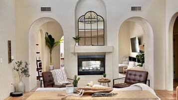 Smart TV, fireplace, books