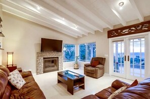 TV, fireplace, books, offices