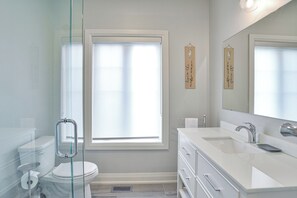 Bathtub, hair dryer, towels, soap