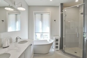 Bathtub, hair dryer, towels
