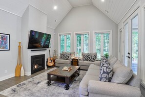 TV, fireplace - The Anchor Cottage  (#71) (Muskoka Lakes)
