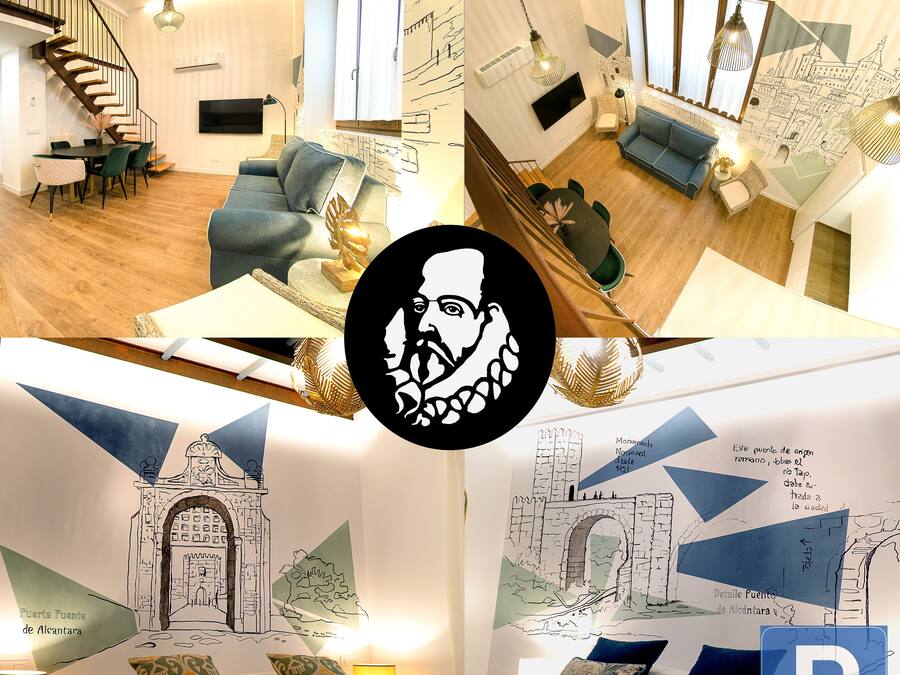 Ein Hotelzimmer mit Treppe, Essbereich und Wohnbereich.