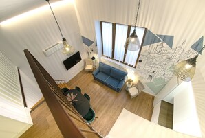 55-inch flat-screen TV with cable channels, TV