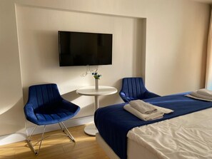 1 chambre, fer et planche à repasser, Wi-Fi, literie fournie