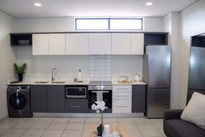 Private kitchen - Contemporary - Clean & Comfortable Apartment  (Pretoria)