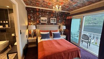 Deluxe Room with Balcony and Fjord View | Individually decorated, individually furnished, desk, laptop workspace