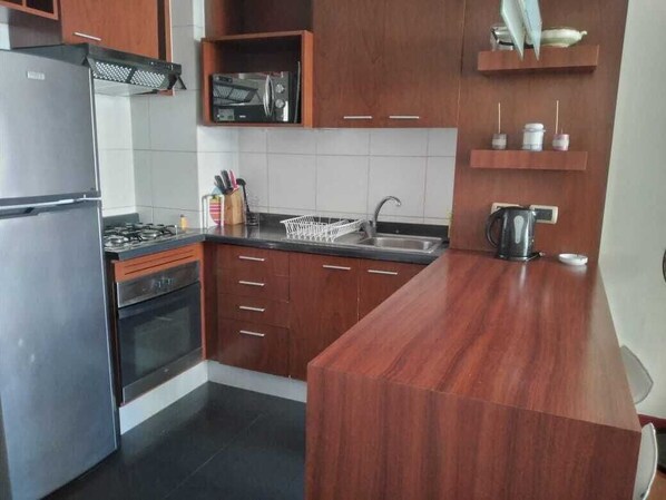 Apartamento básico, 1 cama Queen | Cozinha privada