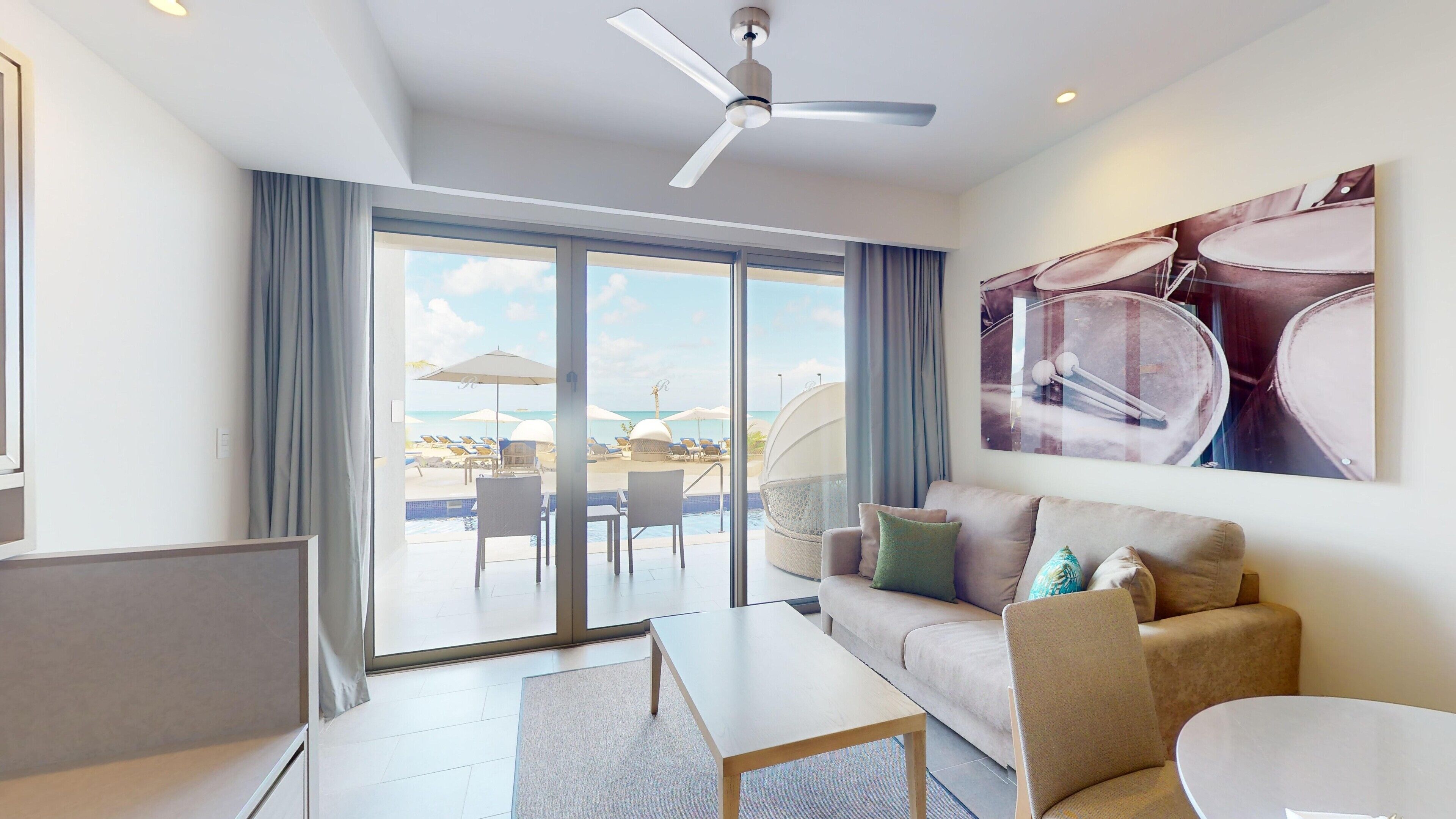 luxury presidential beach front swim out one bedroom suite diamond club | premium bedding, free minibar, in-room safe, individually decorated