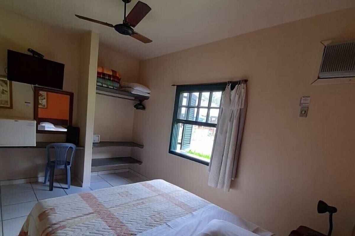 Quarto standard, 1 quarto, no piso térreo | 1 quarto, roupas de cama antialérgicas, frigobar, cofres nos quartos