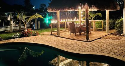 Waterfront home with Private Pool & Dock in Palm City. Pet friendly.