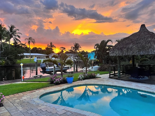 Waterfront home with Private Pool & Dock in Palm City. Pet friendly.