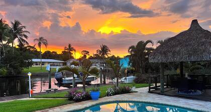 Waterfront home with Private Pool & Dock in Palm City. Pet friendly.