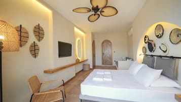 Deluxe Room, 1 Bedroom, Sea View, Beachfront | 1 bedroom, minibar, desk, laptop workspace