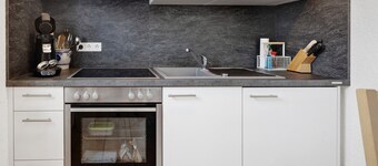 Studio Apartment 'Ferienwohnung Im Bohrer' with Terrace, Shared Garden & Wi-Fi