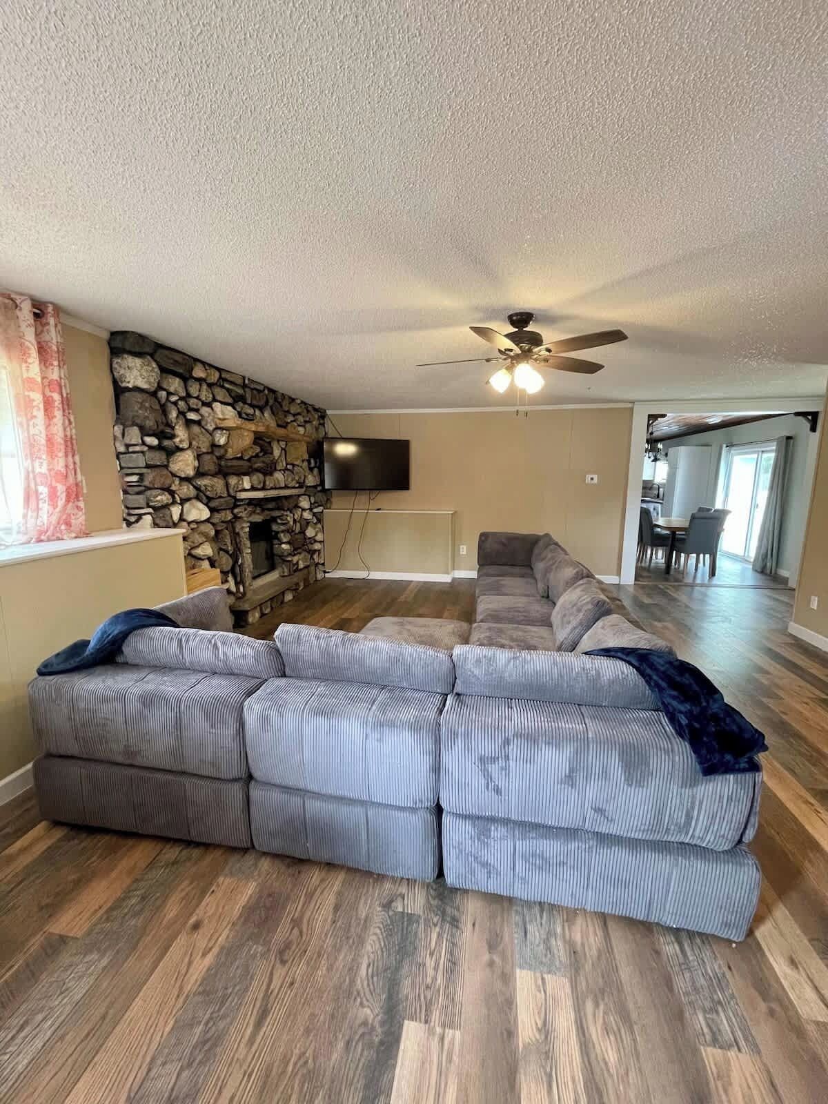 TV, fireplace, books, offices