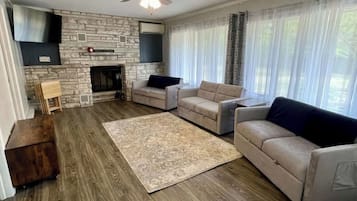 TV, fireplace, books, offices