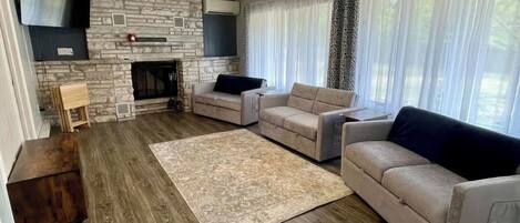 TV, fireplace, books, offices