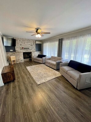 TV, fireplace, books, offices