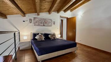 2 dormitorios, tabla de planchar con plancha, wifi gratis y ropa de cama